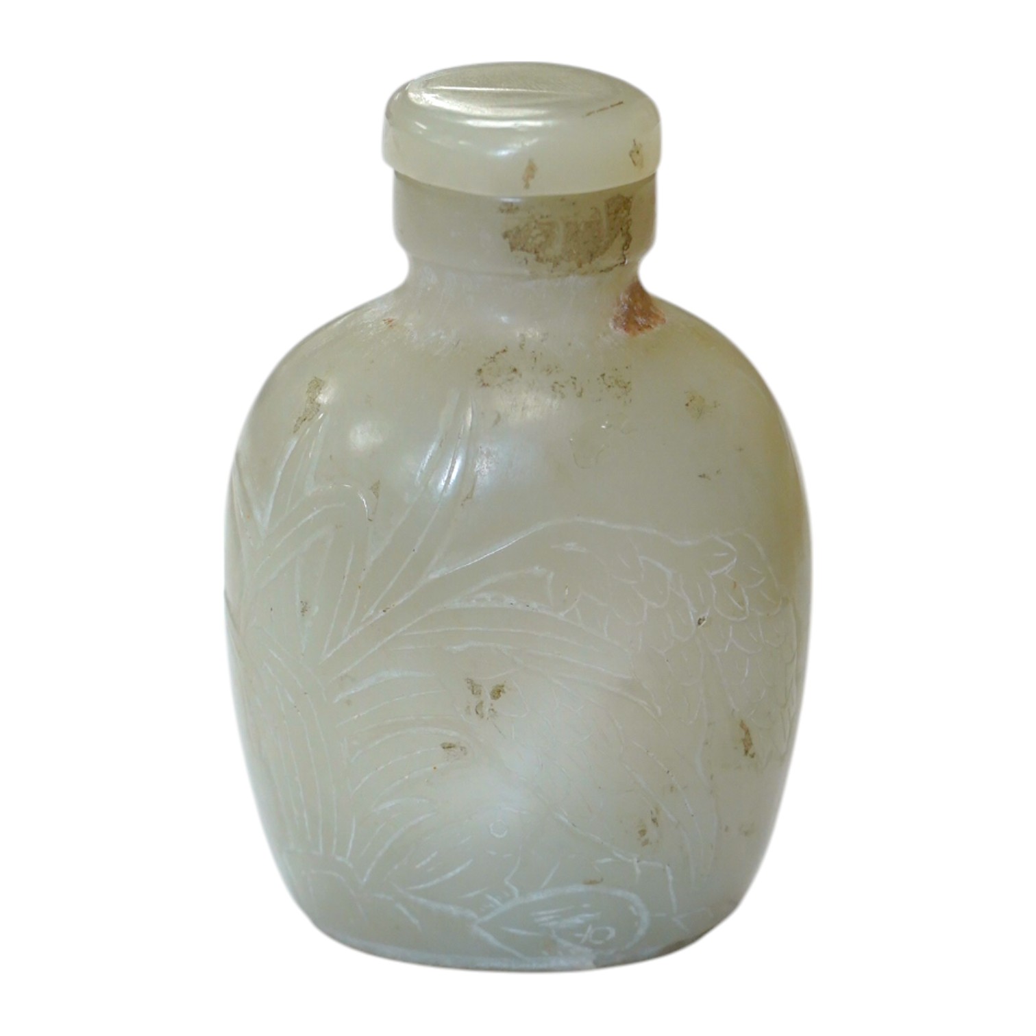 A Chinese carved jade snuff bottle with stopper, 7cm high including stopper. Condition - good